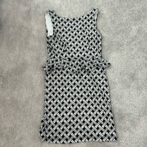Patterned Peplum dress, lined, stretchy. Size 10